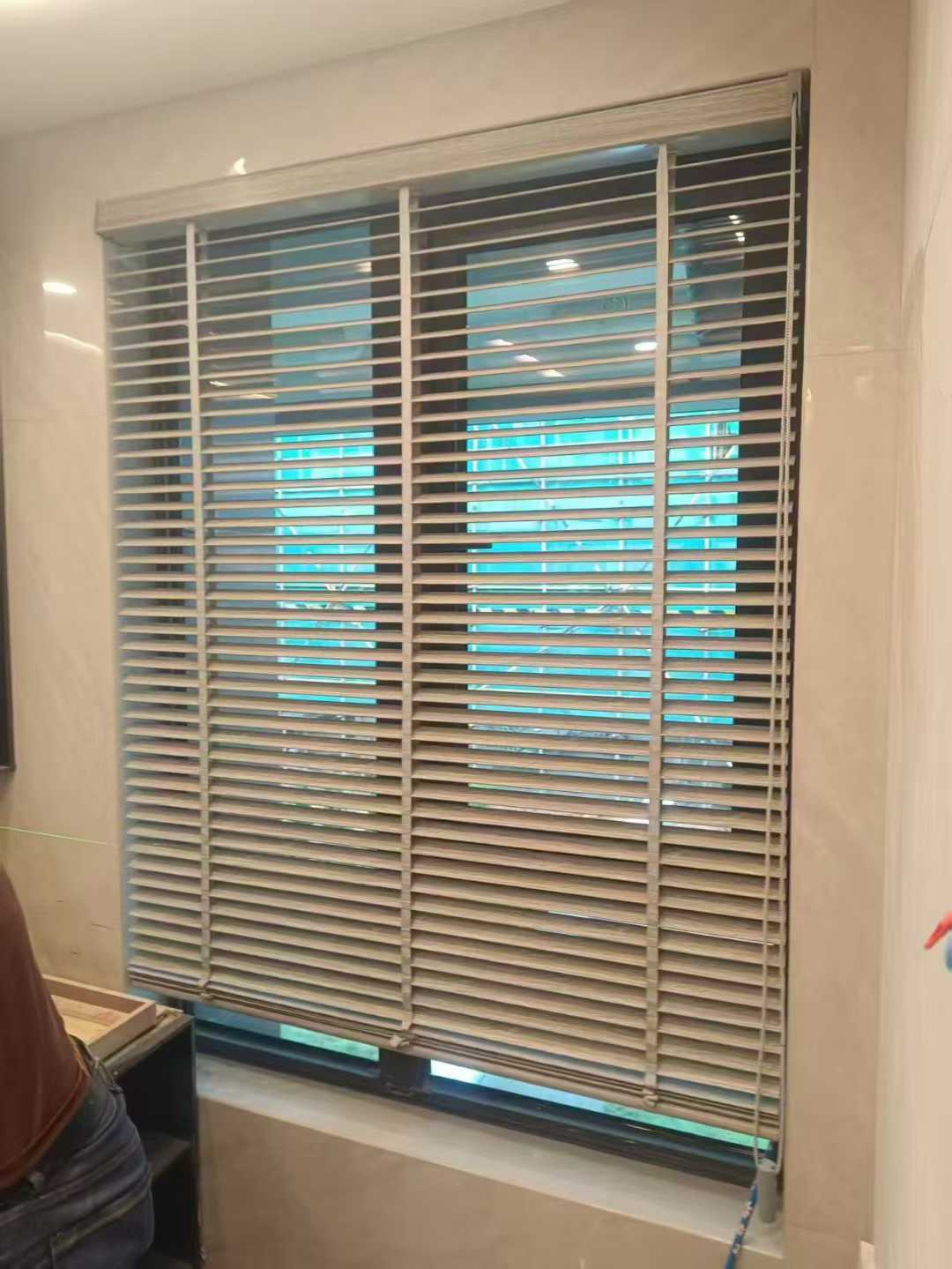 Enjoy peaceful and leisurely moments under wooden blinds